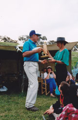 14. Gillian Petersohn receiving her trophy and buckle from ACTERA president Bob Perriman, Brookvale 1990