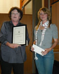Talea Hasko-Stewart receiving her award from ACT Equestrian Association president, Christine Lawrence.
